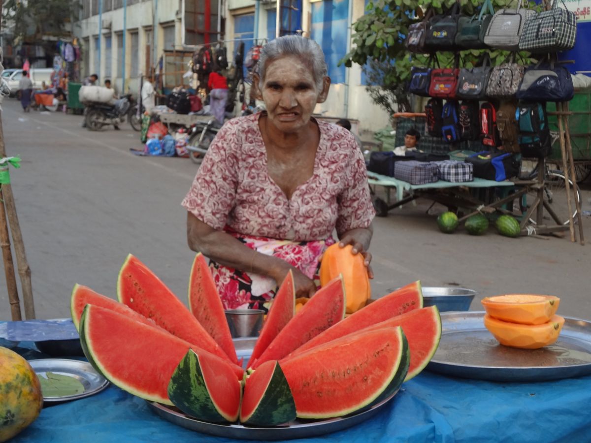 Mandalay fruit market, watermelon cutter